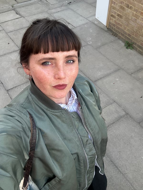 Woman takes selfie outdoors in London
