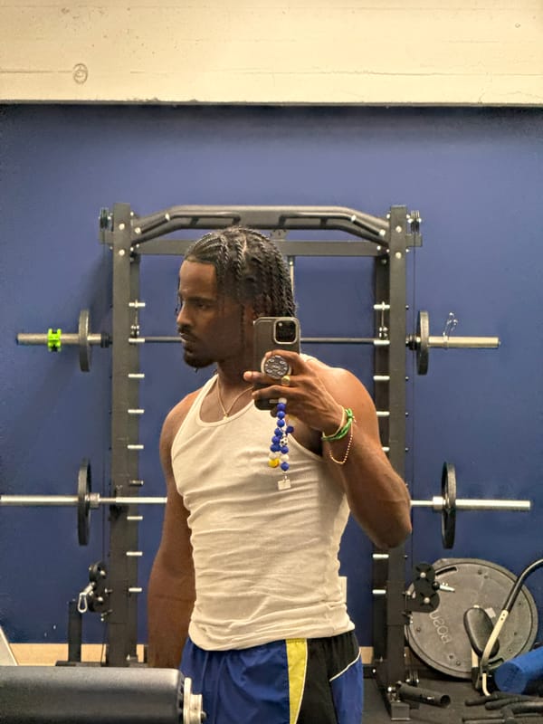 Young athlete takes mirror selfie at Los Angeles gym