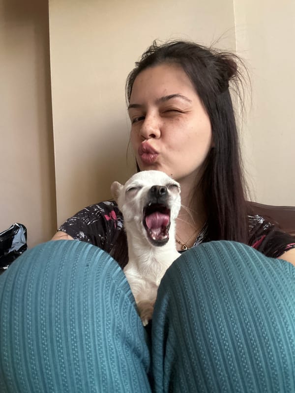 Woman takes selfie with small dog in Bulgaria