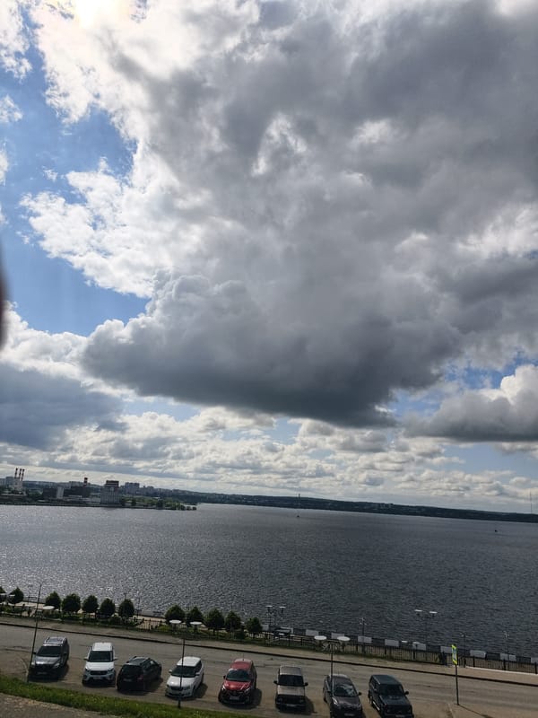 Waterfront scenes captured in Izhevsk under dramatic skies