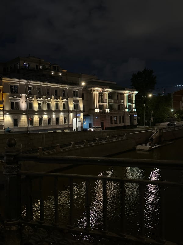 Moscow Music House photographed at night from waterfront