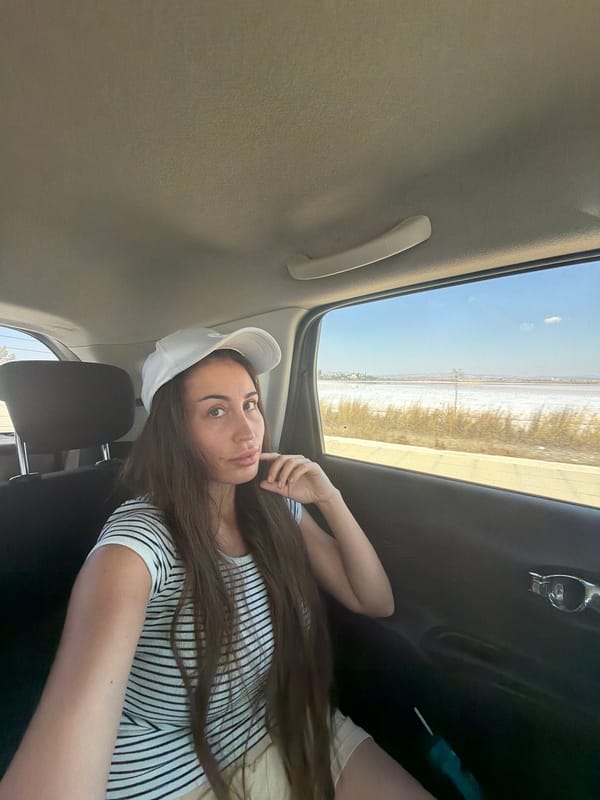 Relaxed back-seat moment on the road in Larnaca, Cyprus.