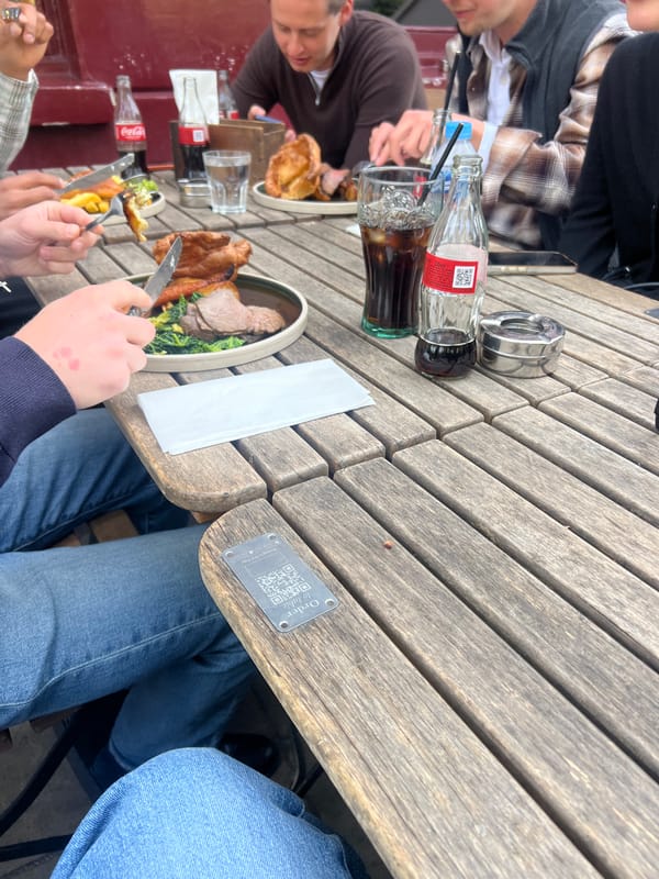 Group enjoys outdoor meal in London on Sunday afternoon