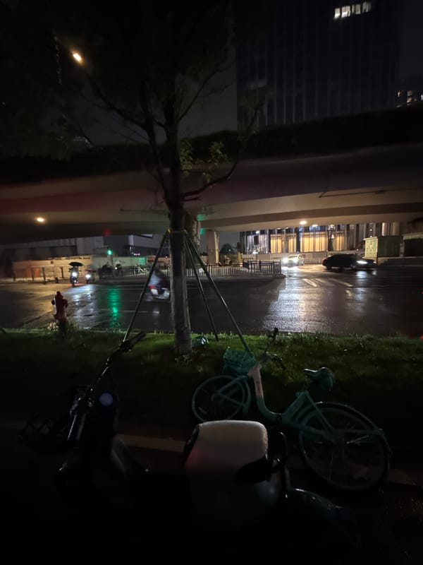 Rainy night street life documented across Guangzhou districts