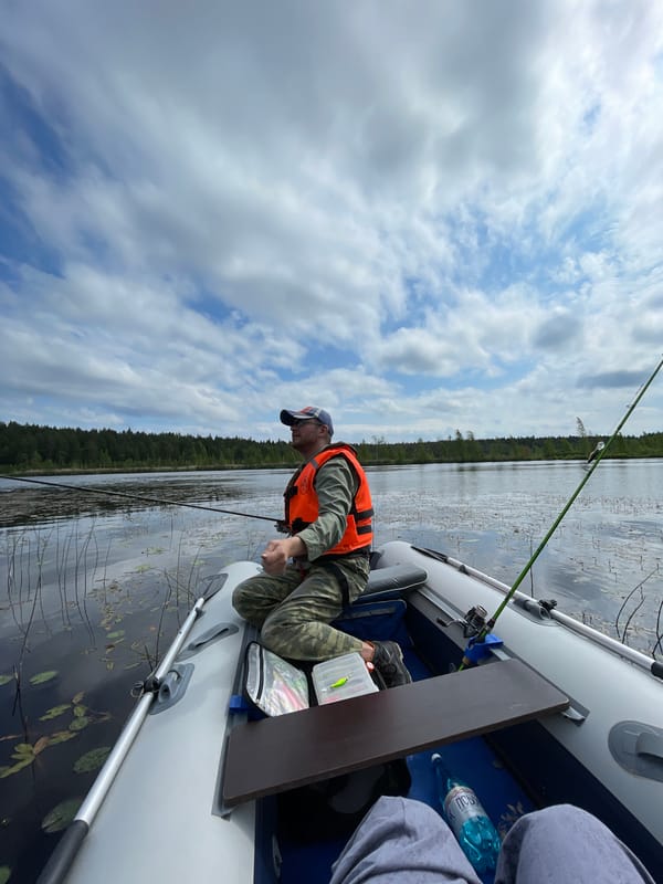 Morning fishing and water lilies observed on Russian lake