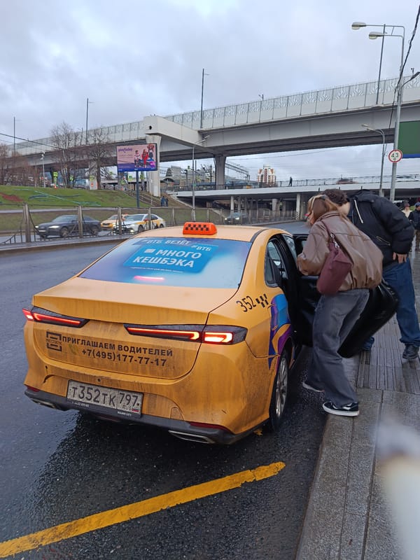 Urban transit scenes: taxi, train passengers documented downtown