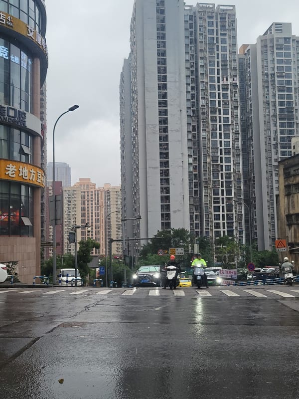 Rainy morning street scenes documented across Liangjiang, China