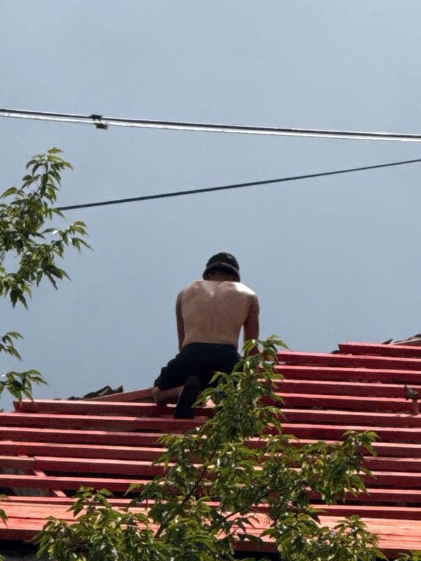 Summer morning in Yekaterinburg: rooftop work, nature, and street life