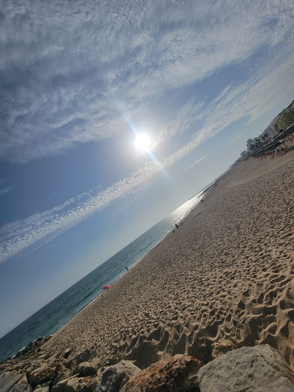 Sunny afternoon at Quarteira beach, Algarve coast