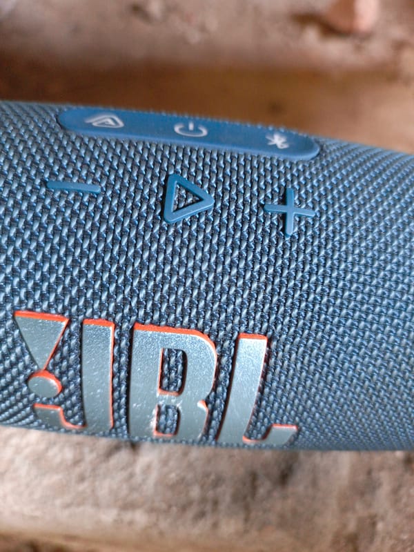 Personal items documented: JBL speaker and Action Bitters bottle