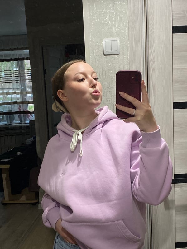 Woman takes selfies in apartment in Chaikovsky, Russia