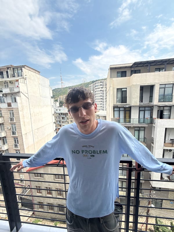 Balcony views and selfies across a Tbilisi afternoon