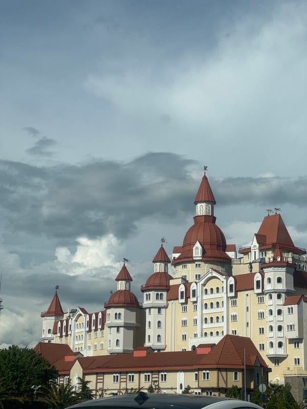 Castle-style building with red towers observed in Sirius, Russia