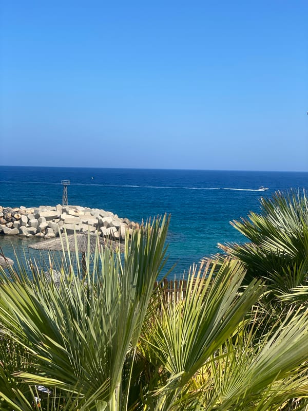 Morning walkthrough of a beachfront resort in Panormos, Crete