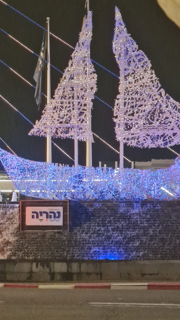 Sailboat light display illuminates Nahariyya streets at night