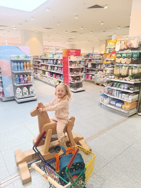 Child plays on mall rides in Varna Bulgaria