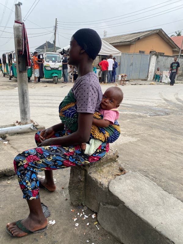 Daily life documented in Ado, Nigeria streets during afternoon