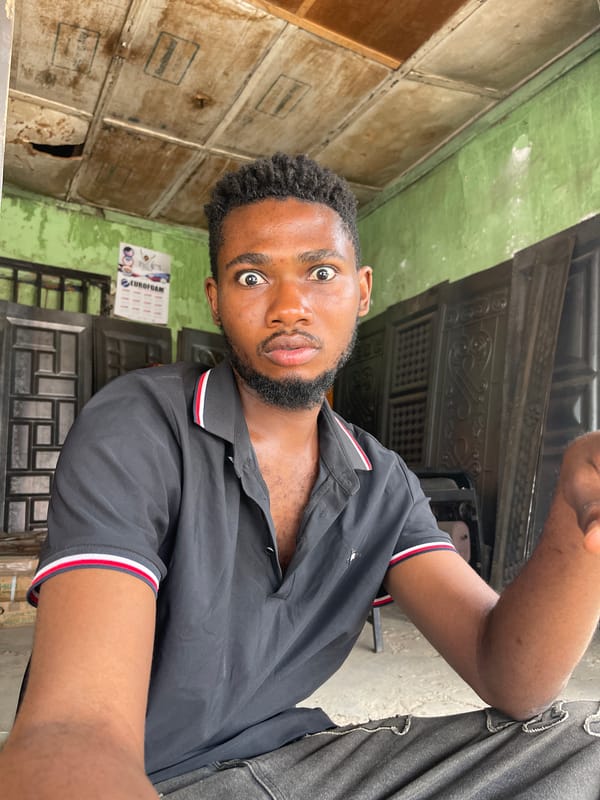 Man photographed gazing intensely at camera in Zaria, Nigeria