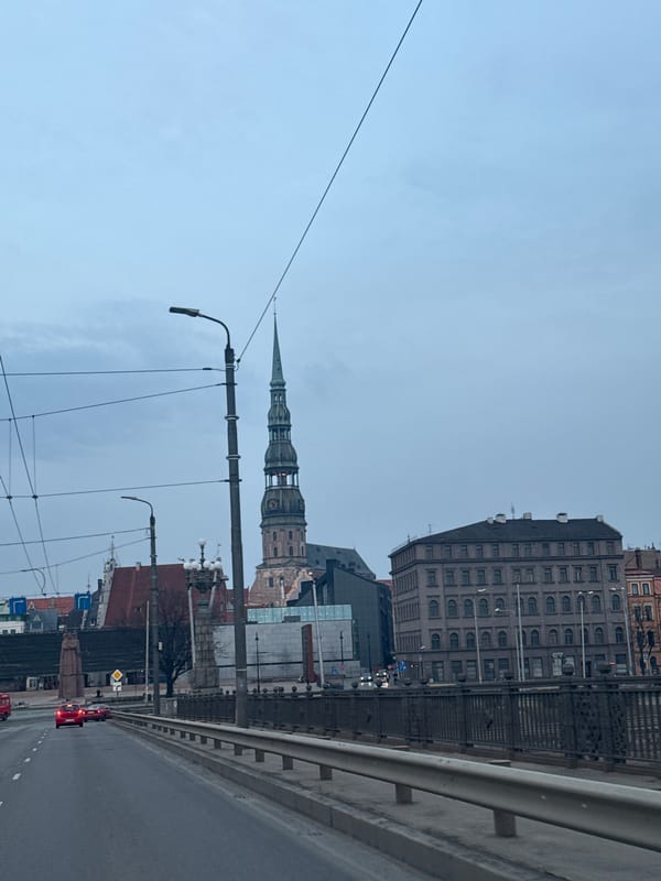 Bridge view captures Riga skyline with St. Peter's Church