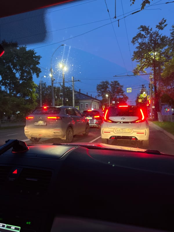 Evening drive through residential Vologda streets after rain