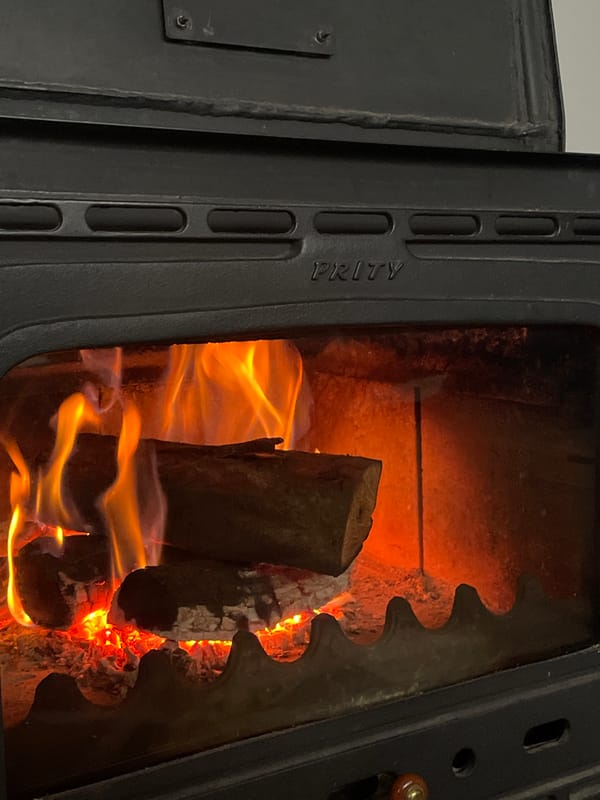 Wood stove fire burning in Bulgarian home
