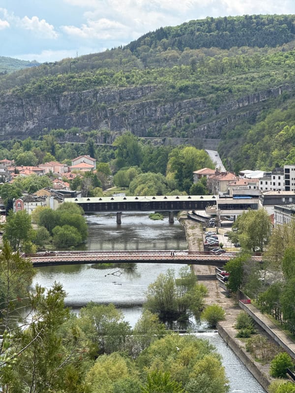 Tourist poses at scenic Lovech overlook in Bulgaria