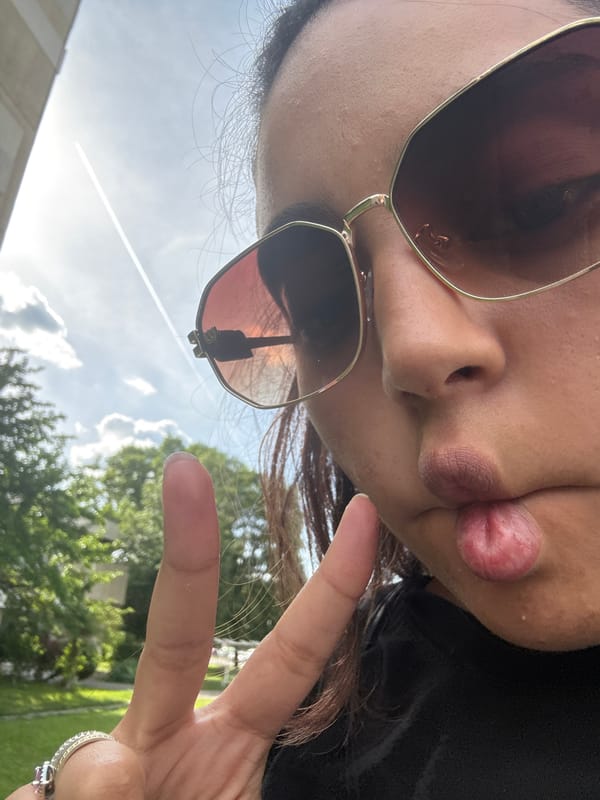Person takes outdoor selfie in Sofia under cloudy skies