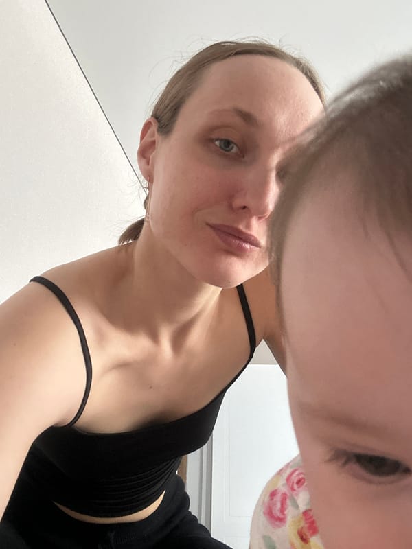 Mother documents morning routine with baby in Russian village