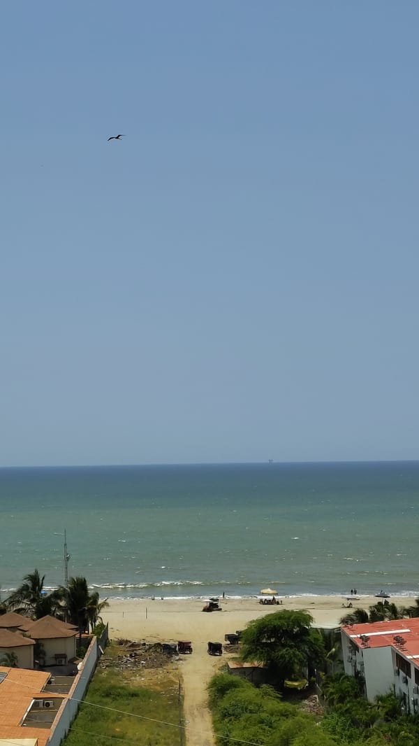Aerial views document coastal village Bocapán, Peru Friday evening