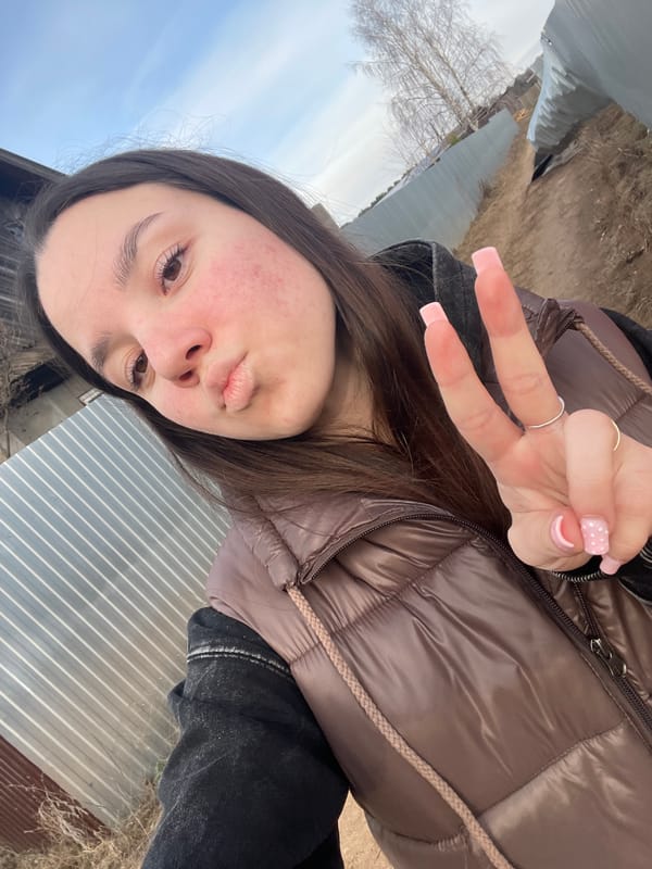 Woman takes selfies in rural Russian village