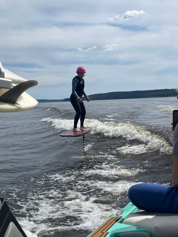 Hydrofoiling on a Russian lake, lifted clean above the water