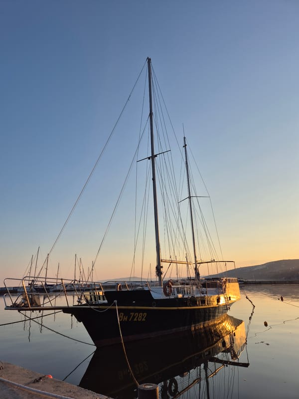 Sunset witnessed over Black Sea harbor in Balchik, Bulgaria