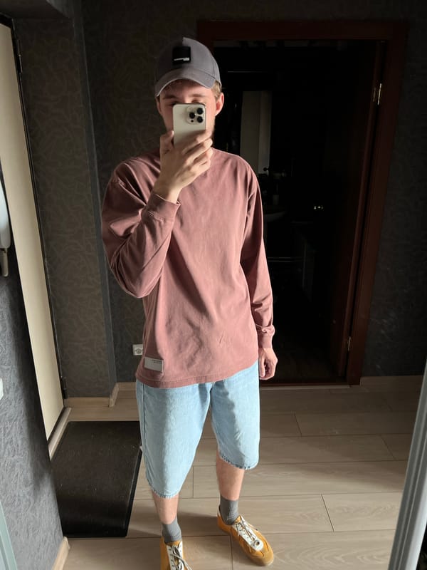 Young man takes mirror selfie in Krasnoyarsk, Russia