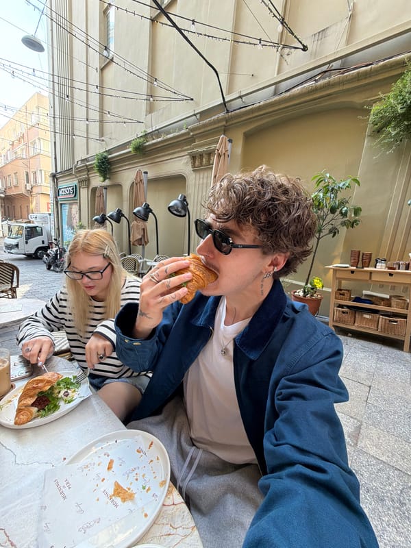 Couple breakfasts at Istanbul café amid military presence