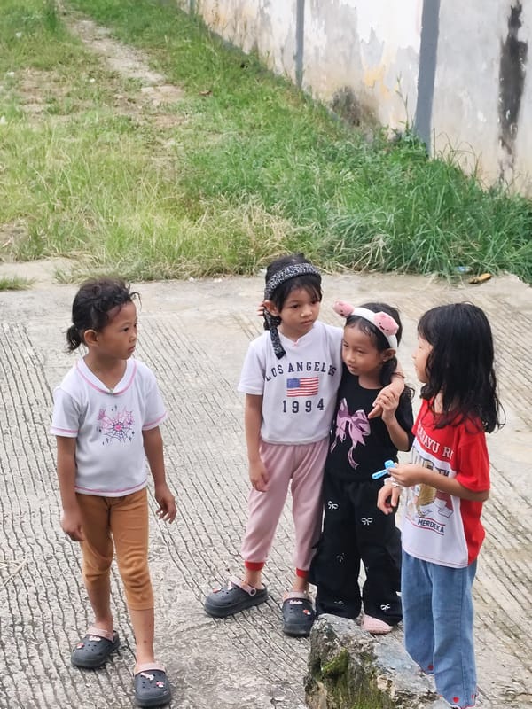 Kids on a residential street, selfies indoors, something in the sky.