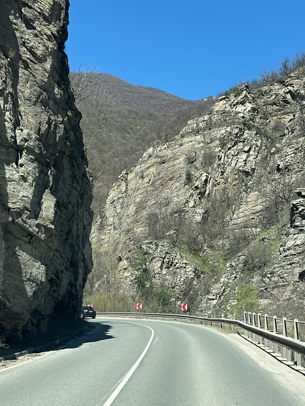 Mountain road with safety features photographed near Dorkovo, Bulgaria
