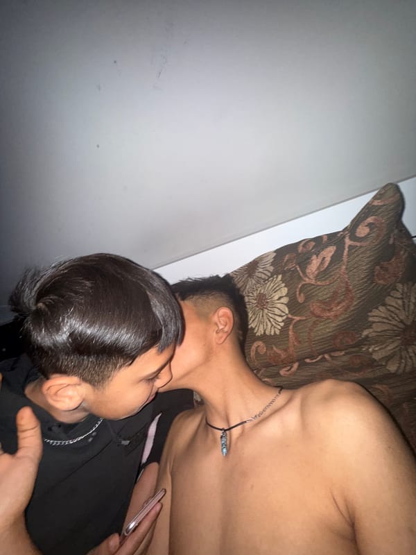 Two individuals rest together indoors in Zlatna Panega