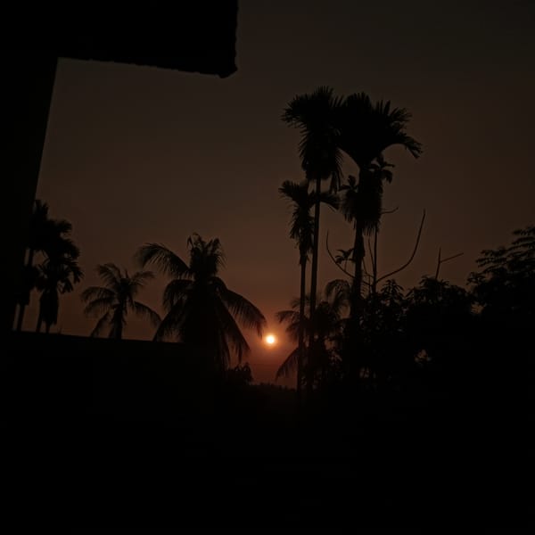 Lhokseumawe sunset fades into a tour bus night scene