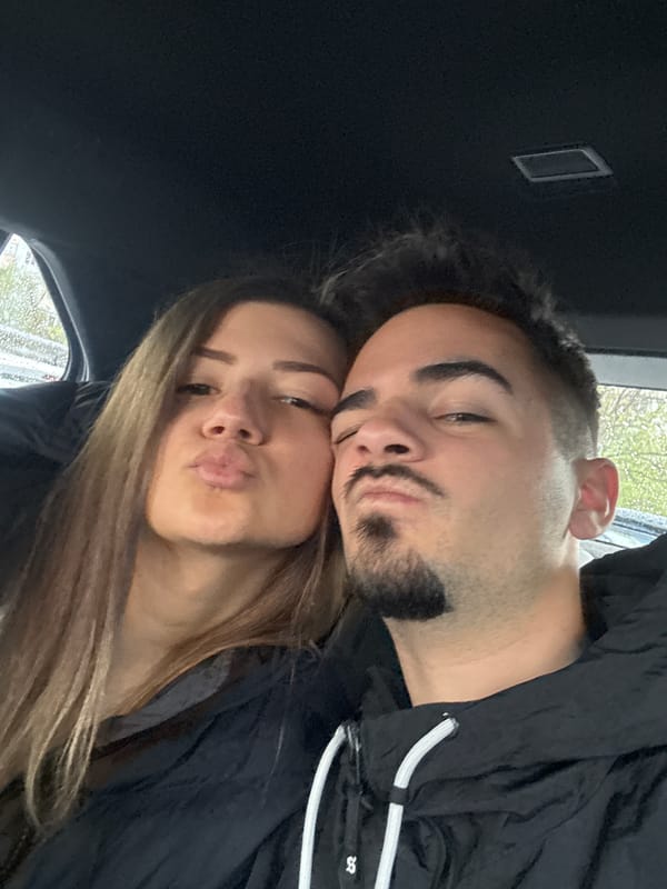 Couple photographed in playful pose in Sofia