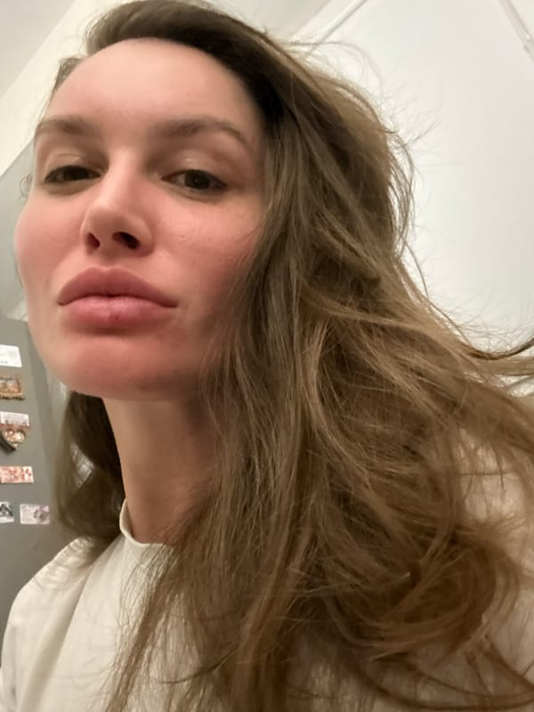 Two women photographed indoors in Moscow evening hours