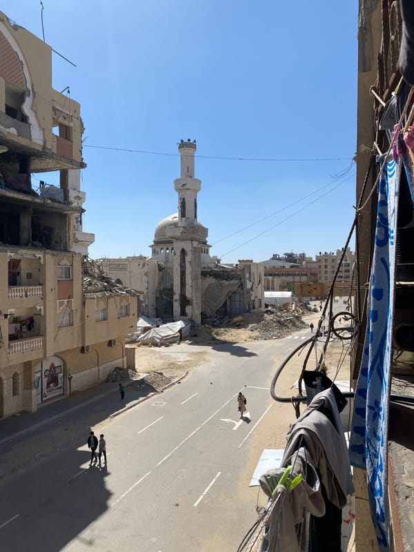 Children play in war-damaged Khan Yunis streets amid rubble