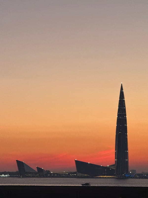 Saint Petersburg skyline at dusk, Lakhta Center and waterways glowing
