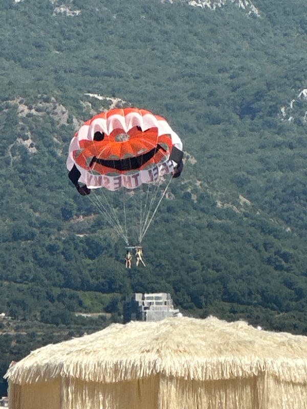 Colorful canopies fill the skies over coastal Montenegro