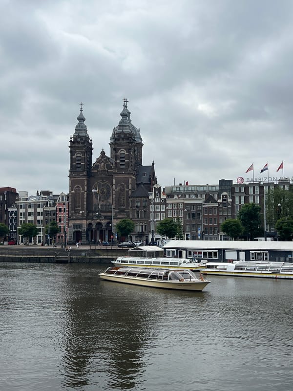 Canal church and Centraal station snapshots in central Amsterdam