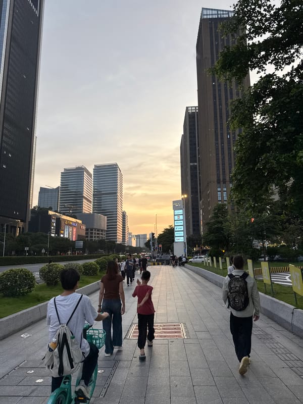 Morning pedestrians navigate crosswalks in Haizhu District, China