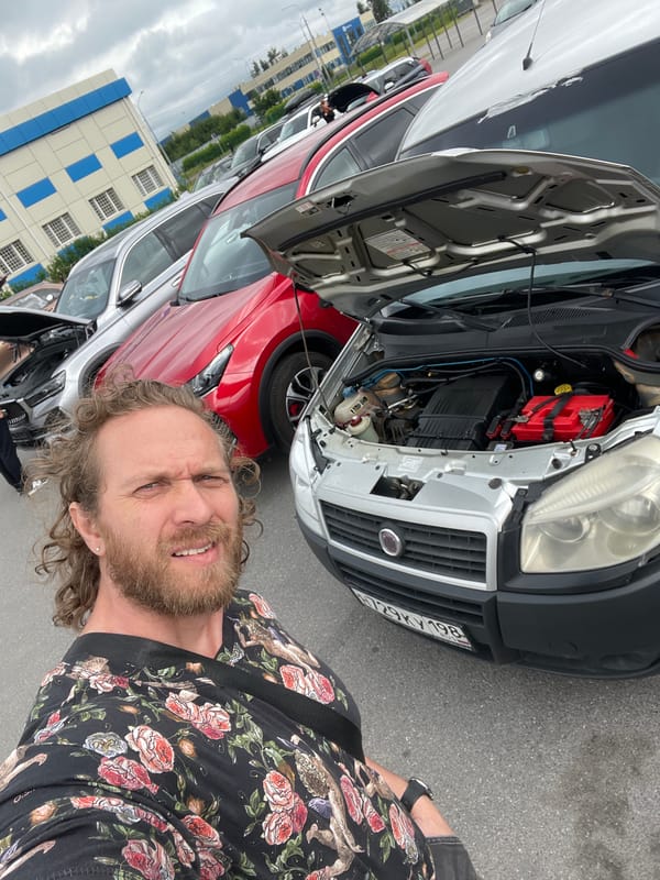 Casual stop in a Saint Petersburg parking lot, July 2026