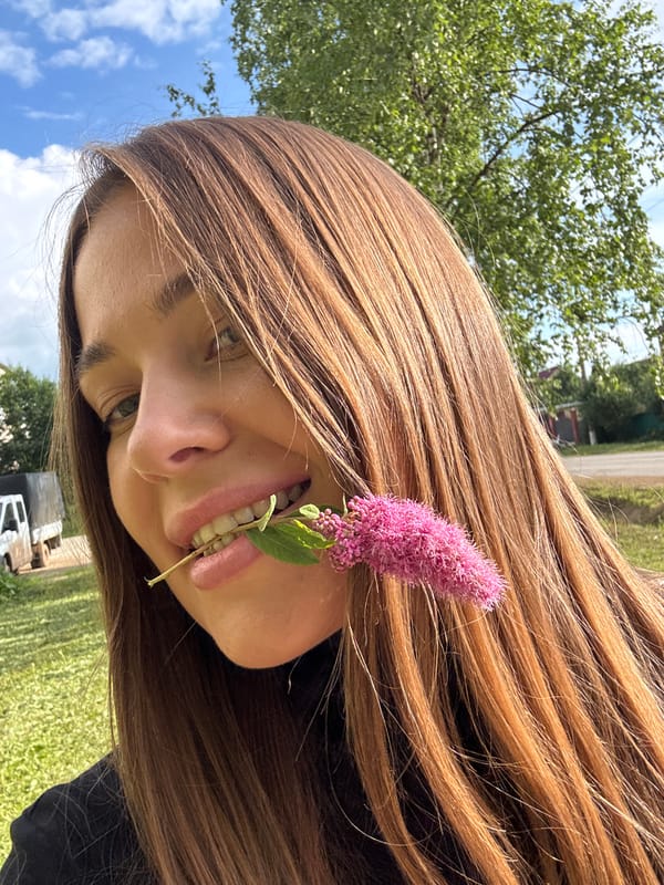 Outdoor selfies with pink flowers in Chernushka, Russia