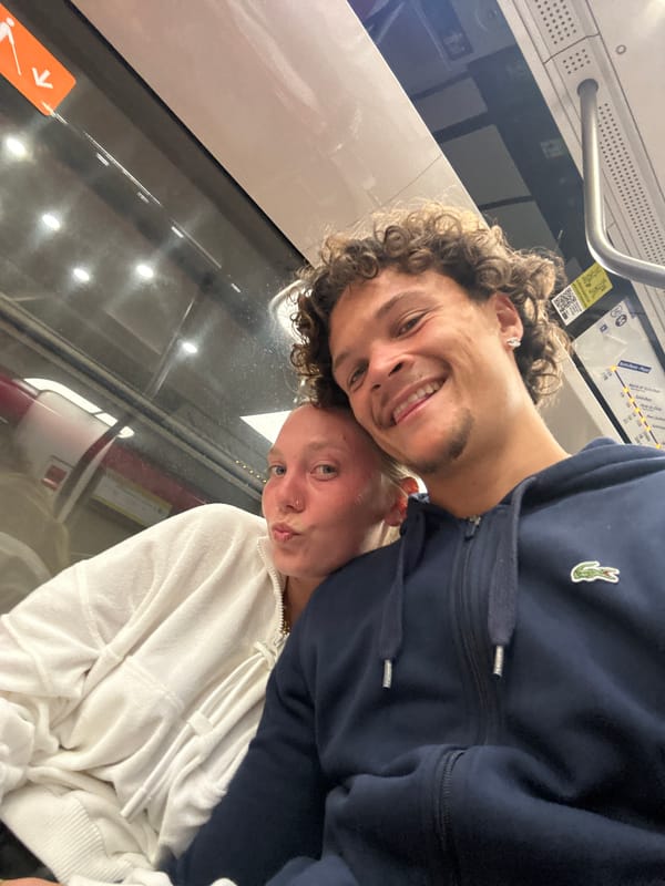 Passengers pose for photos on Paris Metro Line 14