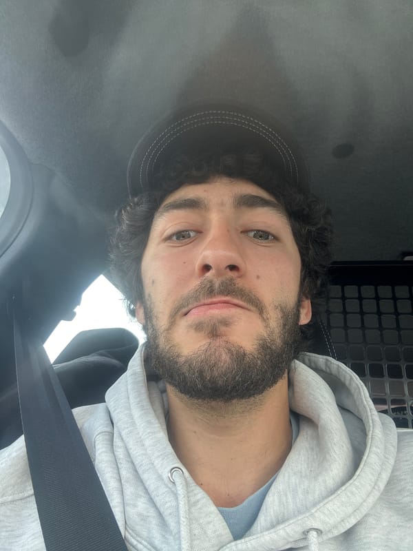 Man takes car selfie in Banteux, France