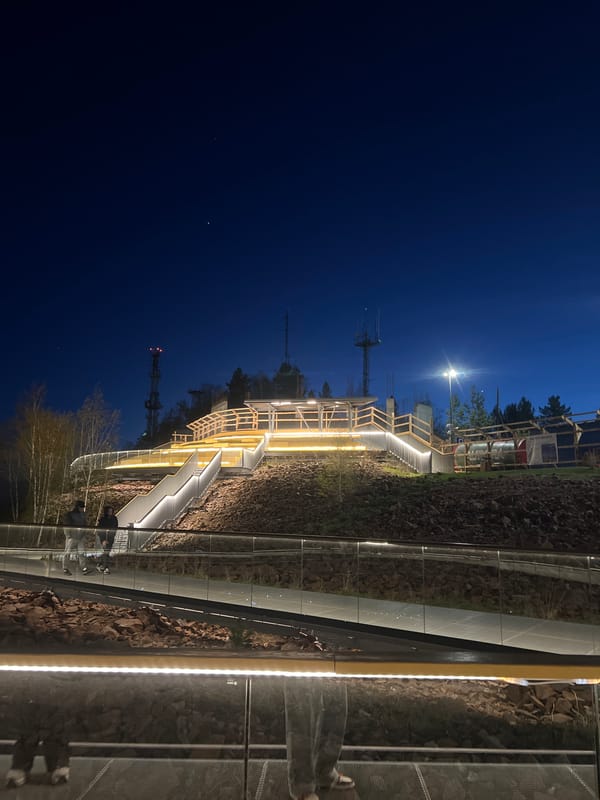 Nighttime illumination captured at Krasnoyarsk's Torgashinsky Ridge observation deck